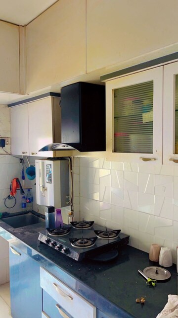 Kitchen in 1 BHK Apartment at RNA NG Canary, Mira Road – for Sale