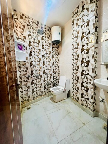 Bathroom in 3 BHK Builder Floor at Dwarka Mor – for Rent