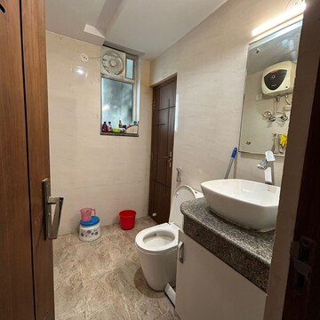 Bathroom in 3 BHK Apartment at Parsvnath Planet, Vibhuti Khand – for Sale