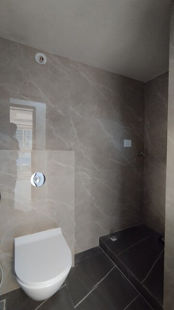Bathroom in 2 BHK Apartment at Triveni Pearl, Khadakpada – for Sale