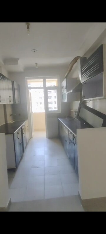 Kitchen in 3.5 BHK Apartment at Amrapali Silicon City, Sector 76 – for Sale