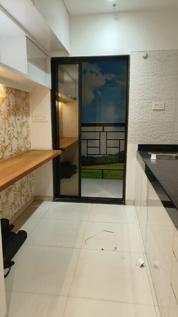 Kitchen in 2 BHK Apartment at Lodha Luxuria, Majiwada – for Sale