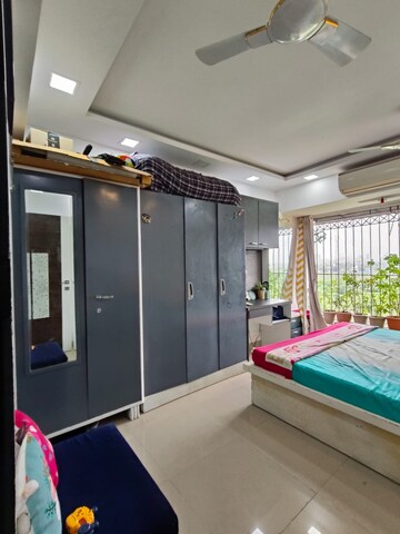 Bedroom in 1 BHK Apartment at Kandivali West – for Sale