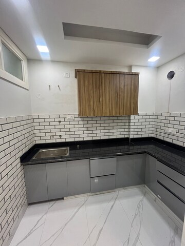 Kitchen in 2 BHK Builder Floor at Gms Road – for Sale