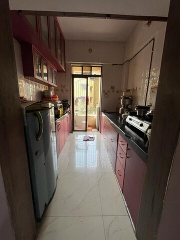 Kitchen in 2 BHK Apartment at Indraprastha CHS Kalyan, Syndicate – for Sale