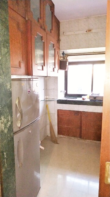 Kitchen in 1 BHK Apartment at NG Complex, Andheri East – for Sale
