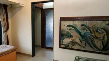 Living Room in 1 BHK Apartment at NG Complex, Andheri East – for Sale