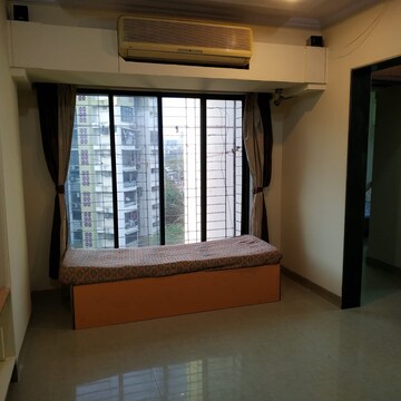 Living Room in 1 BHK Apartment at NG Complex, Andheri East – for Sale