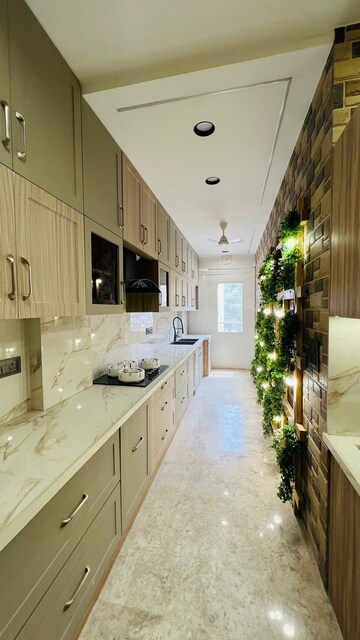 Kitchen in 4 BHK Builder Floor at SS Southend Floors, South City 2 – for Sale