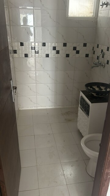 Bathroom in 3 BHK Apartment at Green Valley Heights, Dhakoli Village – for Sale