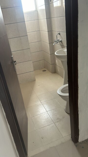 Bathroom in 3 BHK Apartment at Green Valley Heights, Dhakoli Village – for Sale