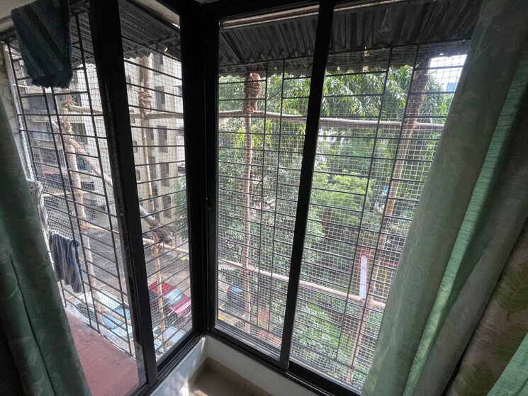 Balcony, d1-d2-lokupwan-phase-ii-chs-ltd 2 Bedroom 950 Sq.Ft. Apartment In Kapur Bawdi Thane 7665224