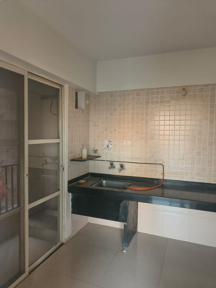 Kitchen, nyati-ebony 1 Bedroom 700 Sq.Ft. Apartment In Undri Pune 7665429