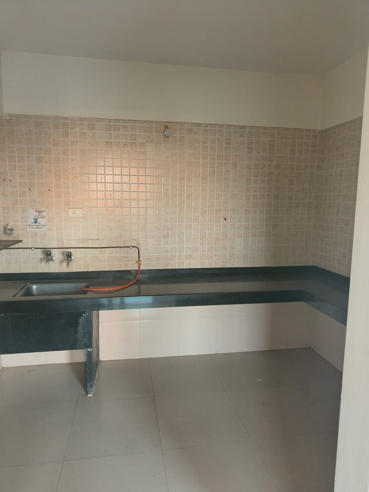 Kitchen, nyati-ebony 1 Bedroom 700 Sq.Ft. Apartment In Undri Pune 7665429