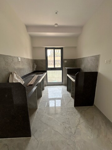 Team Area in 1 BHK Apartment at Ajmera Boulevard, Kanch Pada – for Sale