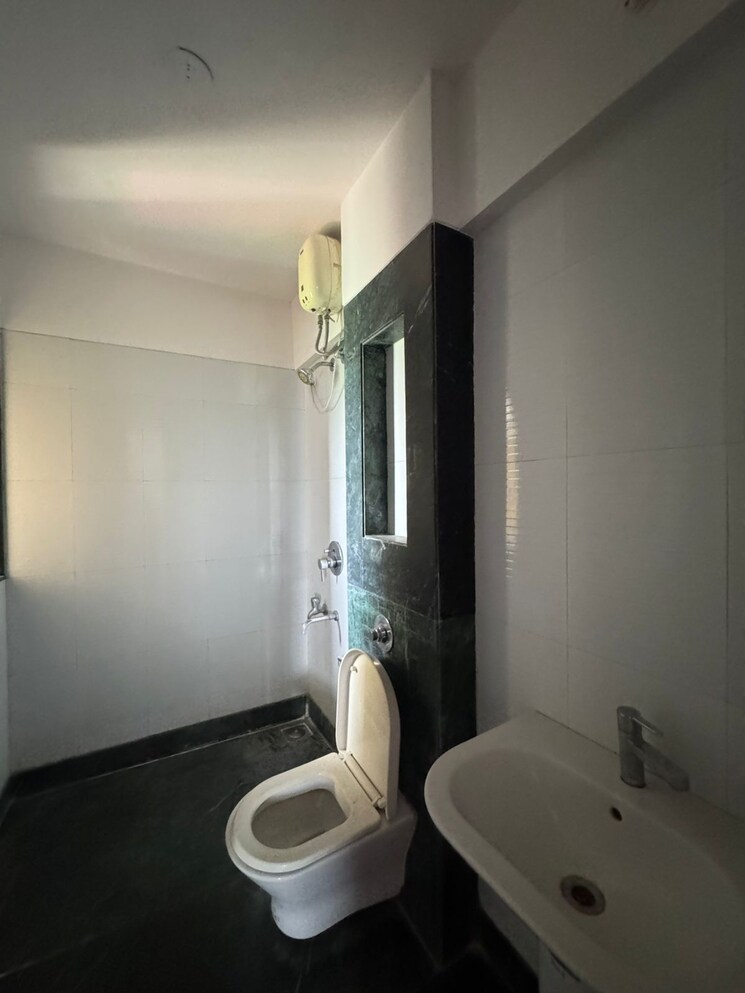 Bathroom, coral-heights 3 Bedroom 950 Sq.Ft. Apartment In Kavesar Thane 7666439