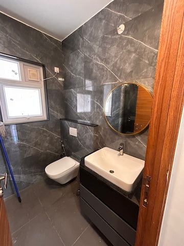 Bathroom in 4 BHK Apartment at Koncept Ambience The Botanika Empress, Gachibowli – for Sale