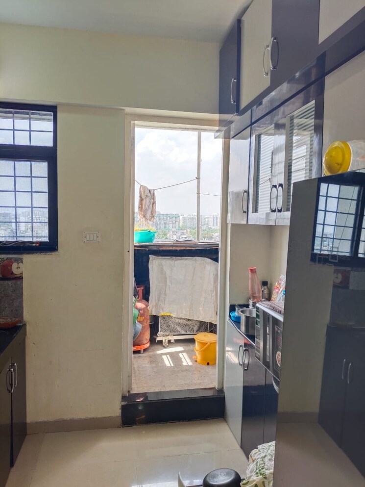 Kitchen, aksha-tulip-swapnalok 2 Bedroom 888 Sq.Ft. Apartment In Moshi Pune 7666856