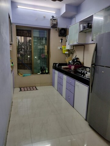 Kitchen in 1 BHK Apartment at Raunak Heights, Ghodbunder Road – for Sale