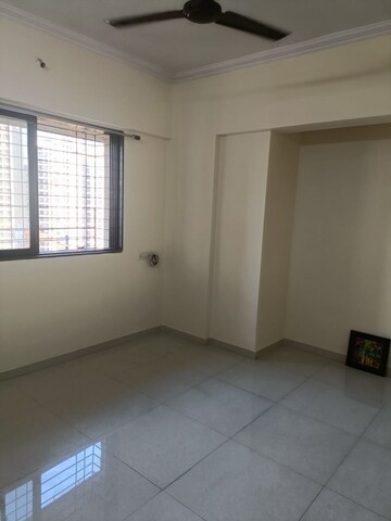 Room in 1 BHK Apartment at Unnati Woods CHS, Kasarvadavali – for Sale