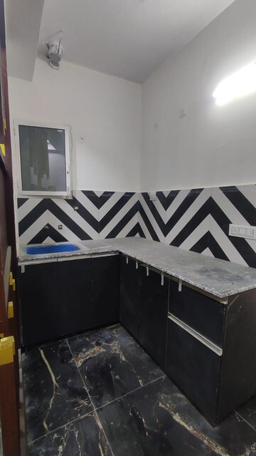 Kitchen in 1.5 BHK Builder Floor at Sector 73 – for Sale
