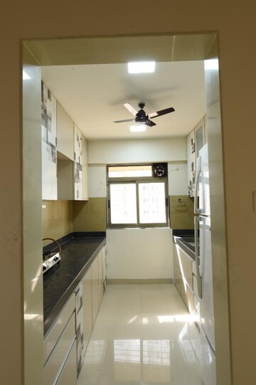 Kitchen in 3 BHK Apartment at Lodha Splendora, Ghodbunder Road – for Sale
