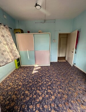 Bedroom in 2 BHK Apartment at Market Yard – for Sale