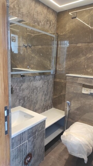 Bathroom in 3 BHK Builder Floor at Mahavir Enclave – for Sale