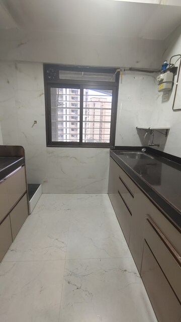 Kitchen in 2 BHK Apartment at Acme Ozone, Manpada – for Sale