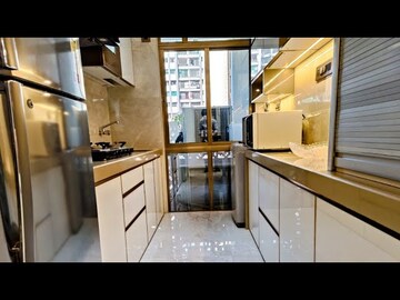 Kitchen in 2 BHK Apartment at Lokhandwala Township Kandivali – for Sale