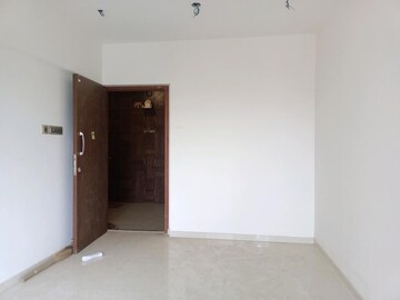 Room in 2 BHK Apartment at Lokhandwala Township Kandivali – for Sale