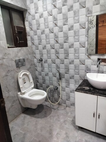 Bathroom in 3 BHK Builder Floor at Dhakoli Village – for Sale