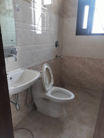 Bathroom in 3 BHK Builder Floor at Dhakoli Village – for Sale