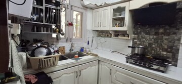 Kitchen in 3 BHK Apartment at Green Valley Heights, Dhakoli Village – for Sale