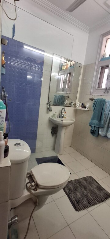 Bathroom in 3 BHK Apartment at Green Valley Heights, Dhakoli Village – for Sale