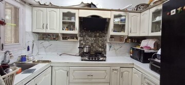Kitchen in 3 BHK Apartment at Green Valley Heights, Dhakoli Village – for Sale