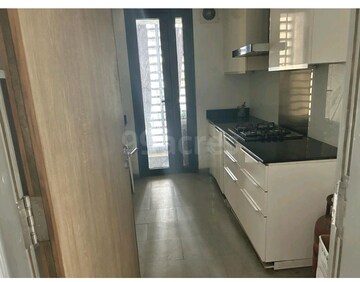 Kitchen in 2 BHK Apartment at Lodha Aura, Wadala – for Sale