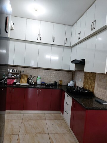 Kitchen in 3 BHK Apartment at Amrapali Golf Homes, Sector 4, Greater Noida – for Sale