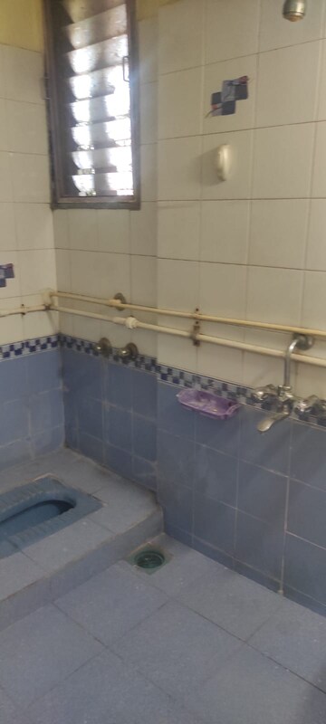 Bathroom in 2 BHK Apartment at Prakruti Park, Brahmand – for Sale
