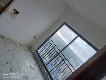 Master Bedroom in 2.5 BHK Apartment at Dynamix Avanya, Dahisar East – for Sale