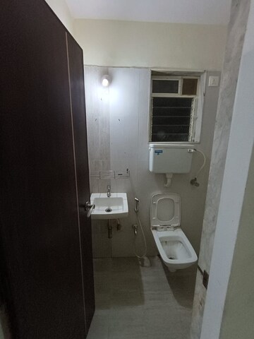 Bathroom in 2 BHK Apartment at Rosa Gardenia, Ghodbunder Road – for Sale