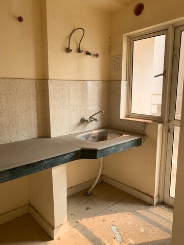 Kitchen in 2.5 BHK Apartment at Paras Tierea, Sector 137 – for Sale