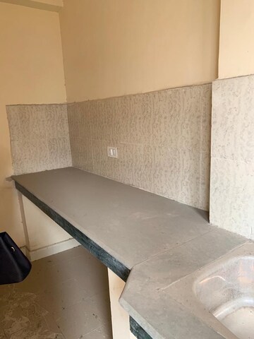 Kitchen in 2.5 BHK Apartment at Paras Tierea, Sector 137 – for Sale