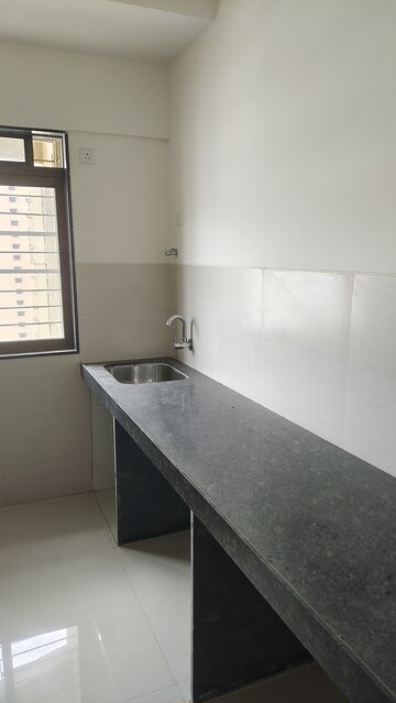 Kitchen in 2 BHK Apartment at Acme Ozone, Manpada – for Sale
