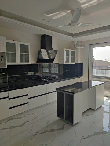 Kitchen in 3 BHK Apartment at DLF Beverly Park II, Sector 25 – for Sale