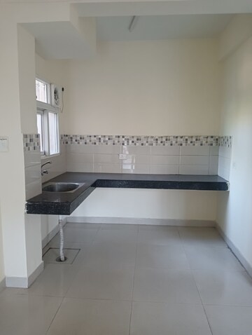 Kitchen in 3 BHK Apartment at Signature Global Orchard Avenue, Sector 93 – for Sale