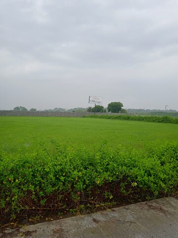 Plot Area in  Plot at Upsidc Site B – for Sale