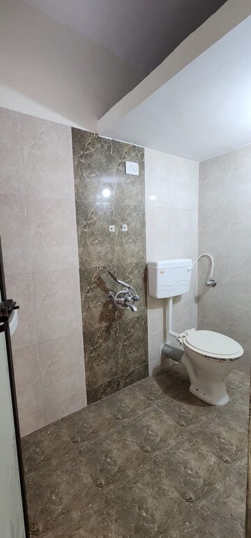Bathroom in 1 BHK Apartment at Shreenath Parasnath Garden, Umroli – for Sale
