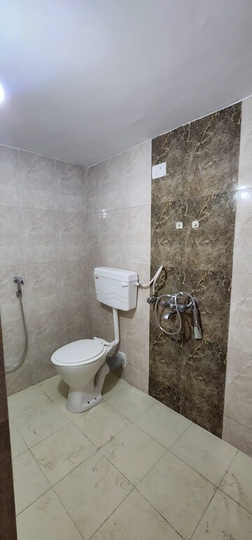 Bathroom in 1 BHK Apartment at Shreenath Parasnath Garden, Umroli – for Sale