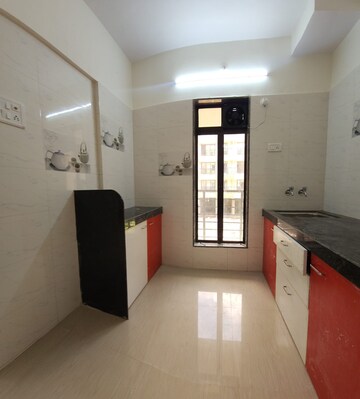 Kitchen in 1 BHK Apartment at Shreenath Parasnath Garden, Umroli – for Sale